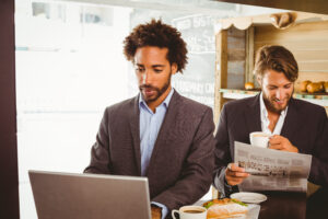 Businessmen enjoying their lunch hour at the coffee shop